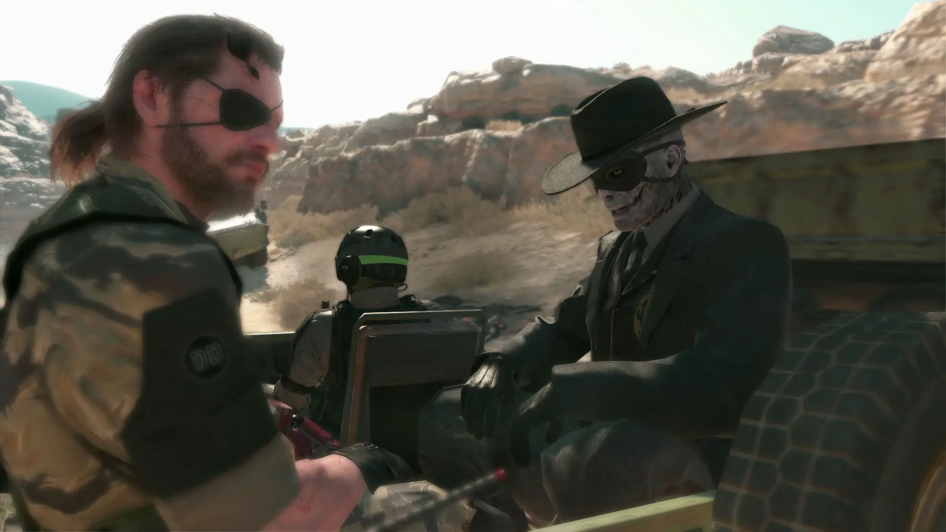 Metal-Gear-Solid-V-The-Phantom-Pain-E3-2015-Screen-Big-Boss-Skull-Face-Riding-Jeep