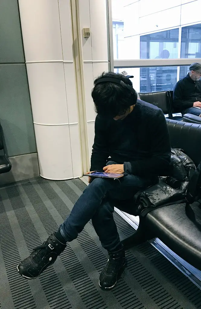 "Checking his new program, HideoTube before departure to our next destination.Welcoming English subtitle volunteers!" - Ayako